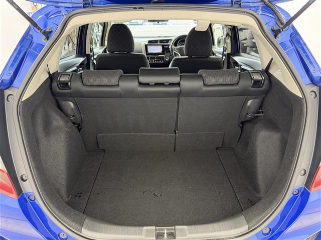 フィット 13G・Lパッケージ シティーブレーキアクティブ【CTBA】 横滑り防止装置 純正ナビ Bluetooth/ワンセグ/AM/FM) 純正ドライブレコーダ アイドリングストップ 革巻きステアオートLEDヘッドライト(24枚目)