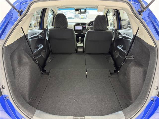 フィット 13G・Lパッケージ シティーブレーキアクティブ【CTBA】 横滑り防止装置 純正ナビ Bluetooth/ワンセグ/AM/FM) 純正ドライブレコーダ アイドリングストップ 革巻きステアオートLEDヘッドライト(26枚目)