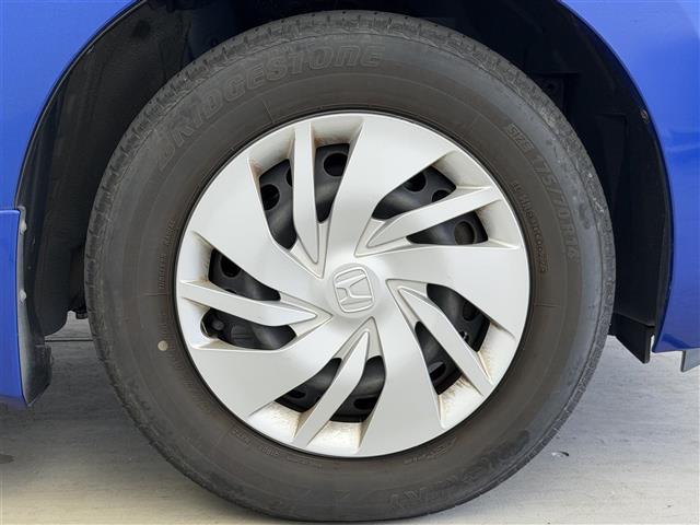 フィット 13G・Lパッケージ シティーブレーキアクティブ【CTBA】 横滑り防止装置 純正ナビ Bluetooth/ワンセグ/AM/FM) 純正ドライブレコーダ アイドリングストップ 革巻きステアオートLEDヘッドライト(39枚目)