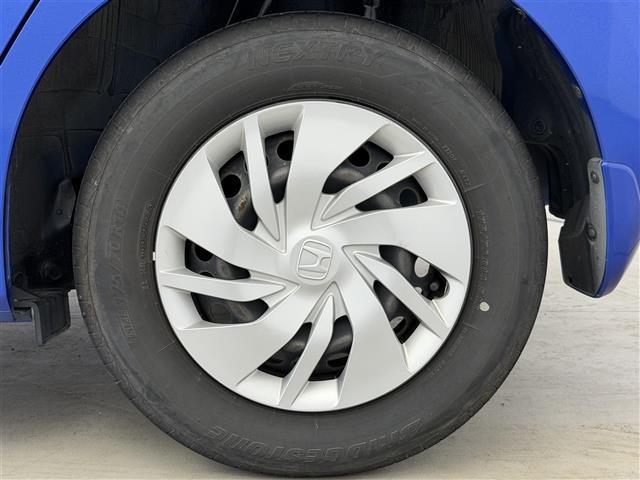 フィット 13G・Lパッケージ シティーブレーキアクティブ【CTBA】 横滑り防止装置 純正ナビ Bluetooth/ワンセグ/AM/FM) 純正ドライブレコーダ アイドリングストップ 革巻きステアオートLEDヘッドライト(40枚目)