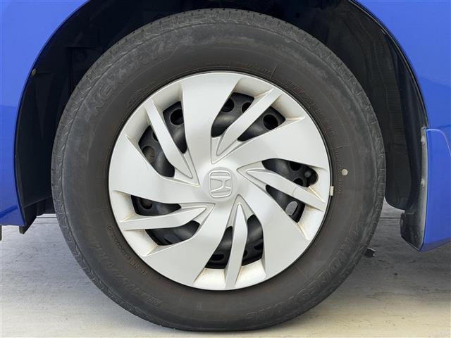 フィット 13G・Lパッケージ シティーブレーキアクティブ【CTBA】 横滑り防止装置 純正ナビ Bluetooth/ワンセグ/AM/FM) 純正ドライブレコーダ アイドリングストップ 革巻きステアオートLEDヘッドライト(41枚目)