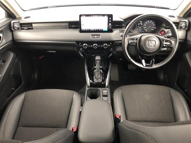 ヴェゼル ｅ：ＨＥＶ　Ｚ　ワンオーナー　純正ナビ　バックカメラ　置くだけ充電　ドラレコ　ＢＳＭ　ＥＴＣ２．０　ハーフレザー　シートヒーター　ステアリングヒーター　電動リアゲード　　純正１８インチＡＷ　衝突軽減システム　ＡＣＣ（2枚目）