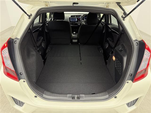 フィットハイブリッド Ｓパッケージ　純正ナビ　バックカメラ　衝突軽減ブレーキ　純正１６インチアルミホイール　クルーズコントロール　ワンセグＴＶ　ＬＥＤヘッドライト　ドライブレコーダー　スマートキー　キーレス　電動格納ミラー　ＥＴＣ（23枚目）