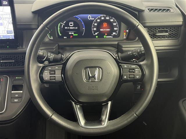 ステップワゴン e:HEVスパーダ 純正ナビ パノラマモニター フリップダウンモニター 両側パワースライドドア BSM 衝突軽減ブレーキ ACC フルセグTV ドライブレコーダー ハーフレザーシート シートヒーター スマートキー ETC(3枚目)