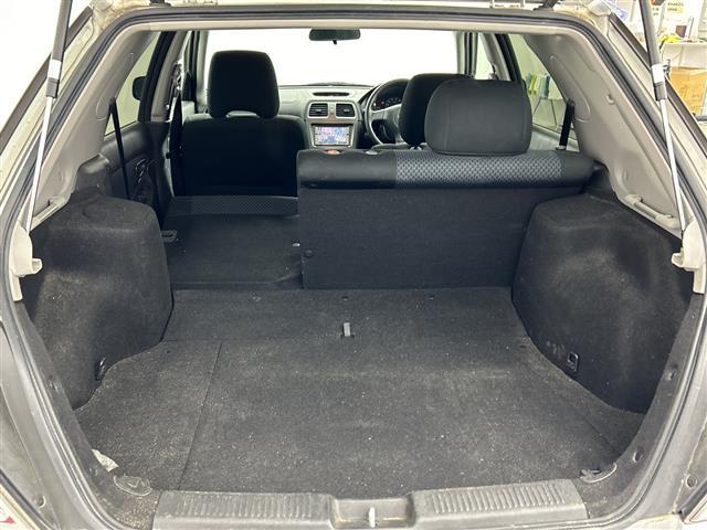 インプレッサスポーツワゴン 1.5iスペシャル 4WD 社外7インチナビ CD/DVDチェンジャー ワンセグTV ETC 社外スタッドレスタイヤ サマータイヤ付 社外フロアマット(24枚目)