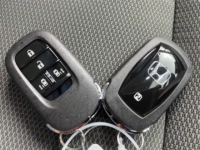 フリード e:HEVクロスター 先行車発進お知らせ機能 歩行者事故低減ステアリング 路外逸脱抑制機能 標識認識機能 渋滞追従機能付アダプティブクルーズコントロール 車線維持支援システム トラフィックジャムアシスト クロスター専用AW(38枚目)