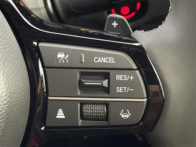 ステップワゴン ｅ：ＨＥＶスパーダ　追従型クルーズコントロール　レーンキープアシスト　横滑り防止　衝突軽減ブレーキ　両側パワースライドドア　パワーバックドア　ＬＥＤヘッドライト　オートライト　オートマチックハイビーム　シートヒーター（10枚目）