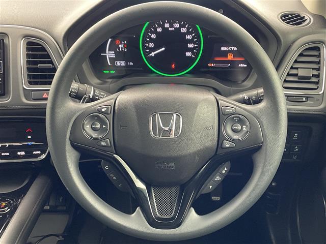 ヴェゼル ハイブリッド・ホンダセンシング　純正７インチナビ　ＣＤ　ＤＶＤ　Ｂｌｕｅｔｏｏｔｈ　フルセグ　バックカメラ　前後ドライブレコーダー　レーダークルーズコントロール　パドルシフト　ステアリングスイッチ　ＥＴＣ　レザーシート　スマートキー（9枚目）