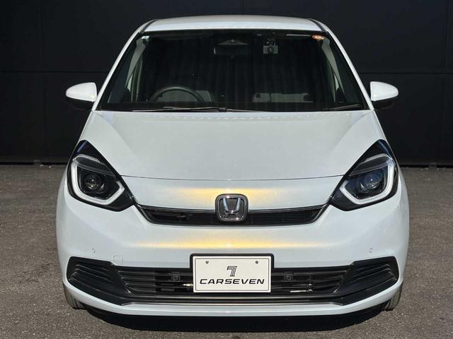 フィット ホーム 当社レンタアップ車両 ホンダセンシング 社外メモリーナビ Bluetooth接続 バックカメラ 前後ドライブレコーダー ETC 電子パーキングブレーキ スマートキー フルオートエアコン 禁煙車(3枚目)