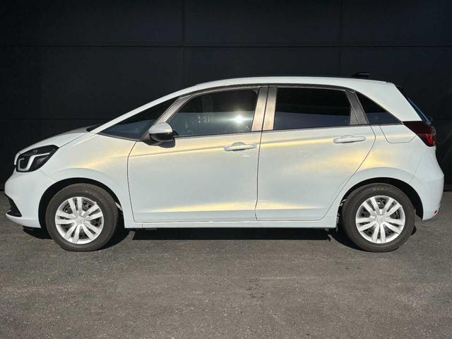 フィット ホーム 当社レンタアップ車両 ホンダセンシング 社外メモリーナビ Bluetooth接続 バックカメラ 前後ドライブレコーダー ETC 電子パーキングブレーキ スマートキー フルオートエアコン 禁煙車(4枚目)