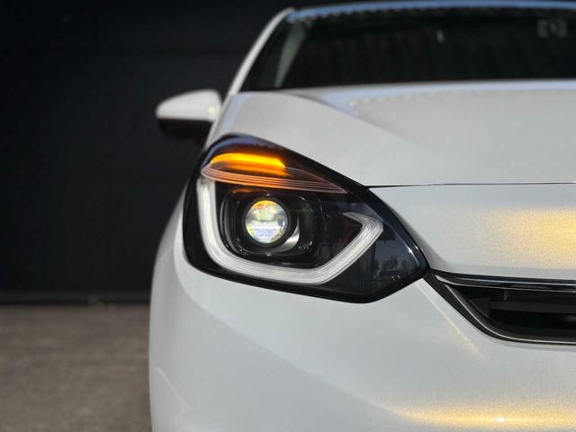 フィット ホーム 当社レンタアップ車両 ホンダセンシング 社外メモリーナビ Bluetooth接続 バックカメラ 前後ドライブレコーダー ETC 電子パーキングブレーキ スマートキー フルオートエアコン 禁煙車(37枚目)