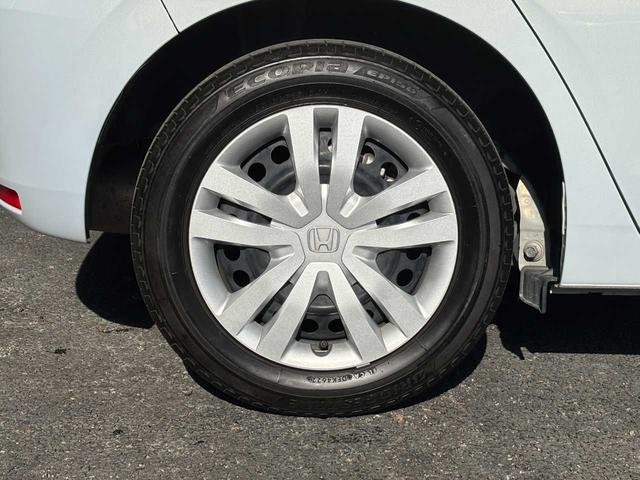 フィット ホーム 当社レンタアップ車両 ホンダセンシング 社外メモリーナビ Bluetooth接続 バックカメラ 前後ドライブレコーダー ETC 電子パーキングブレーキ スマートキー フルオートエアコン 禁煙車(40枚目)