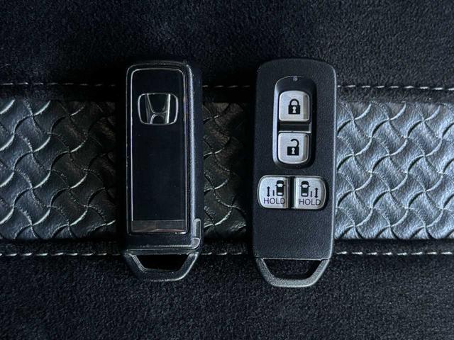 N-BOXカスタム Lターボ 4WD ホンダセンシング 純正メモリーナビ Bluetooth接続 CD/DVD再生 フルセグTV視聴 バックカメラ ETC 純正15インチアルミ 大型ルーフコンソール ワンオーナー 禁煙車(9枚目)