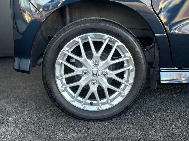 N-BOXカスタム Lターボ 4WD ホンダセンシング 純正メモリーナビ Bluetooth接続 CD/DVD再生 フルセグTV視聴 バックカメラ ETC 純正15インチアルミ 大型ルーフコンソール ワンオーナー 禁煙車(47枚目)