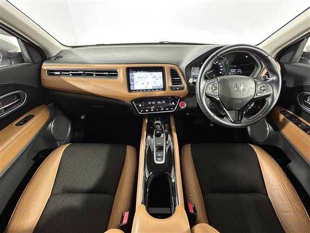 ヴェゼル ハイブリッドZ・ホンダセンシング 純正8型ナビ ホンダセンシング クルーズコントロール バックカメラ ドライブレコーダー ビルトインETC ステアリングスイッチ パドルシフト ハーフレザーシート 前席シートヒーター 純正17インチAW(2枚目)