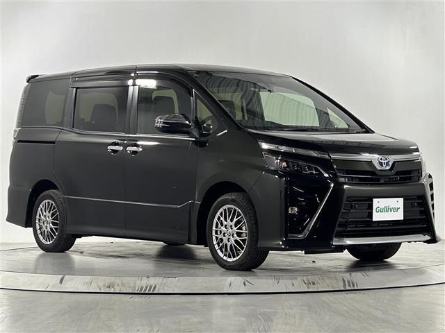 ヴォクシー ハイブリッドＺＳ　煌ＩＩＩ　純正９型ナビ　クルコン　バックカメラ　ＥＴＣ　前後ドラレコ　ウォークスルー　純正フロアマット　ハーフレザーシート　シートヒーター　両側パワスラ　純正１６インチＡＷ　横滑り防止装置　コーナーセンサー（29枚目）