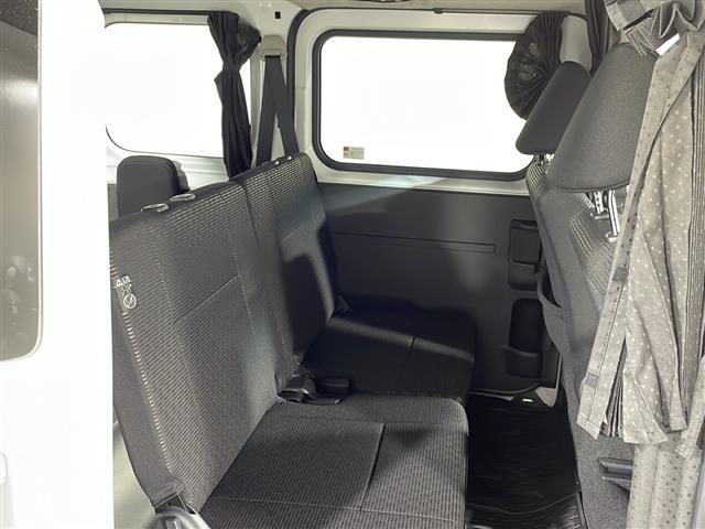 ハイゼットカーゴ クルーズ　禁煙車　社外ナビ（ＢＴ，フルセグ，ＣＤ／ＤＶＤ，ラジオ）　バックカメラ　マルチレール　オーバーヘッドネット　オーバーヘッドシェルフ　間仕切カーテン　荷室マット　クリアランスソナー　スマートアシスト（24枚目）
