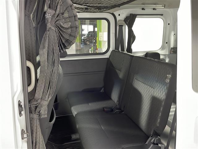 ハイゼットカーゴ クルーズ　禁煙車　社外ナビ（ＢＴ，フルセグ，ＣＤ／ＤＶＤ，ラジオ）　バックカメラ　マルチレール　オーバーヘッドネット　オーバーヘッドシェルフ　間仕切カーテン　荷室マット　クリアランスソナー　スマートアシスト（25枚目）