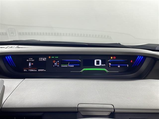 フリードハイブリッド ハイブリッド・Ｇホンダセンシング　県外仕入れ　禁煙車　６名乗り　純正ナビ　ワンセグ　ＣＤ　Ｂｌｕｅｔｏｏｔｈ　両側パワースライドドア　ホンダセンシング　クルーズコントロール　ビルトインＥＴＣ　スマートキー　スペアキー１本（6枚目）