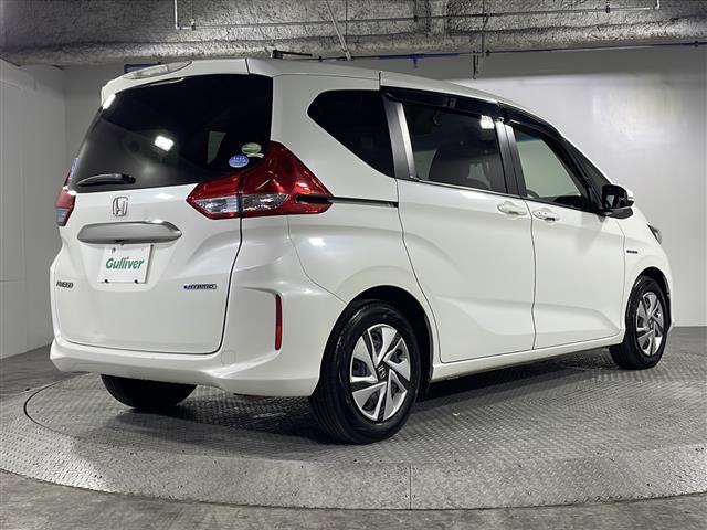 フリードハイブリッド ハイブリッド・Ｇホンダセンシング　県外仕入れ　禁煙車　６名乗り　純正ナビ　ワンセグ　ＣＤ　Ｂｌｕｅｔｏｏｔｈ　両側パワースライドドア　ホンダセンシング　クルーズコントロール　ビルトインＥＴＣ　スマートキー　スペアキー１本（35枚目）