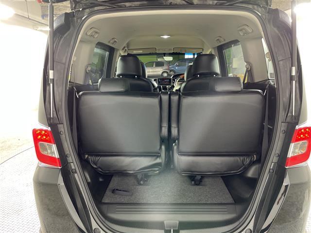 フリードハイブリッド ジャストセレクション　禁煙車　両側電動パワースライドドア　社外サブウーファー　社外ナビ　（ＣＤ／Ｂｌｕｅｔｏｏｔｈ／フルセグＴＶ）　バックカメラ　革調シートカバー　社外ツイーター　純正ラバーマット　オートライト　ＥＴＣ（26枚目）