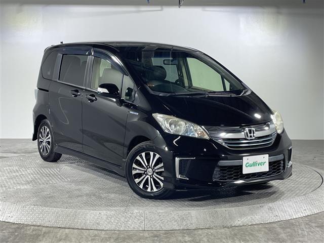 フリードハイブリッド ジャストセレクション　禁煙車　両側電動パワースライドドア　社外サブウーファー　社外ナビ　（ＣＤ／Ｂｌｕｅｔｏｏｔｈ／フルセグＴＶ）　バックカメラ　革調シートカバー　社外ツイーター　純正ラバーマット　オートライト　ＥＴＣ（28枚目）