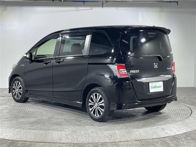 フリードハイブリッド ジャストセレクション　禁煙車　両側電動パワースライドドア　社外サブウーファー　社外ナビ　（ＣＤ／Ｂｌｕｅｔｏｏｔｈ／フルセグＴＶ）　バックカメラ　革調シートカバー　社外ツイーター　純正ラバーマット　オートライト　ＥＴＣ（29枚目）