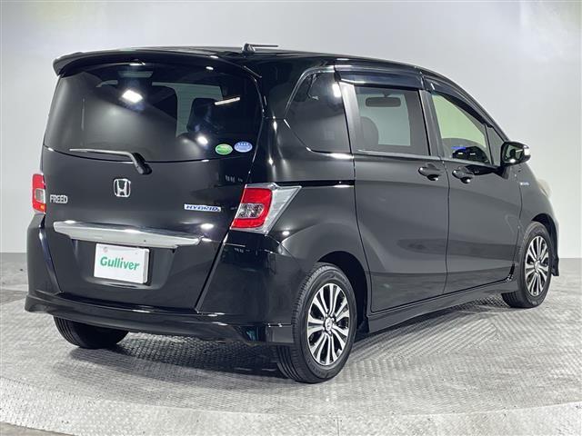 フリードハイブリッド ジャストセレクション　禁煙車　両側電動パワースライドドア　社外サブウーファー　社外ナビ　（ＣＤ／Ｂｌｕｅｔｏｏｔｈ／フルセグＴＶ）　バックカメラ　革調シートカバー　社外ツイーター　純正ラバーマット　オートライト　ＥＴＣ（31枚目）