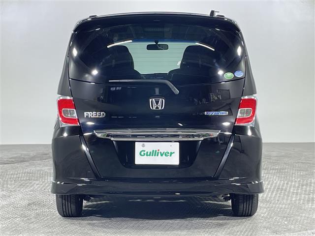フリードハイブリッド ジャストセレクション　禁煙車　両側電動パワースライドドア　社外サブウーファー　社外ナビ　（ＣＤ／Ｂｌｕｅｔｏｏｔｈ／フルセグＴＶ）　バックカメラ　革調シートカバー　社外ツイーター　純正ラバーマット　オートライト　ＥＴＣ（35枚目）