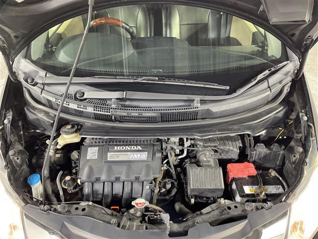 フリードハイブリッド ジャストセレクション　禁煙車　両側電動パワースライドドア　社外サブウーファー　社外ナビ　（ＣＤ／Ｂｌｕｅｔｏｏｔｈ／フルセグＴＶ）　バックカメラ　革調シートカバー　社外ツイーター　純正ラバーマット　オートライト　ＥＴＣ（42枚目）