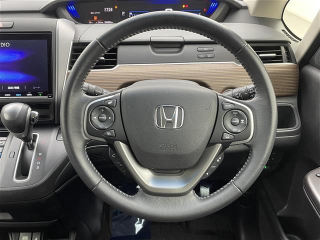 フリード クロスター・ホンダセンシング 純正9型ナビ 両側パワースライドドア アダプティブクルーズコントロール 衝突軽減ブレーキ レーンキープアシスト 専用コンビシート バックモニター LEDヘッドライト ルーフレール フルセグTV 禁煙車(3枚目)