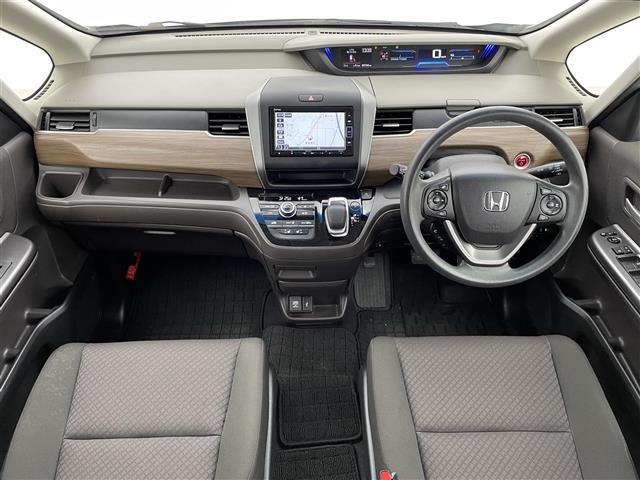 フリードハイブリッド ハイブリッド・Ｇホンダセンシング　純正ナビ　両側電動スライド　ハンズフリーオートスライド　アダプティブクルーズコントロール　衝突軽減ブレーキ　レーンキープアシスト　バックモニター　ＬＥＤヘッドライト　シートヒーター　ビルトインＥＴＣ（2枚目）