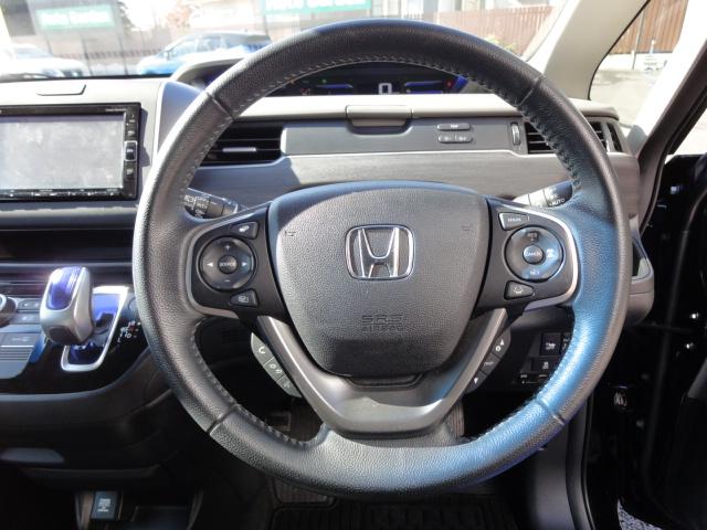 フリードハイブリッド ハイブリッド・Gホンダセンシング 【修復歴なし】【保証あり】純正ナビ Bカメラ ETC ドライブレコーダー ホンダセンシング 追従式オートクルーズ フォグランプ 保証書 取説 スペアキー有 両側パワースライドドア 3列シート 7人乗り(22枚目)