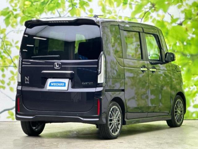 N-BOXカスタム ターボ 新品タイヤ/保証書/純正 9インチ ナビ/ホンダセンシング/両側電動スライドドア/シートヒーター 前席/マルチビューカメラシステム/車線逸脱防止支援システム/シート ハーフレザー ターボ バックカメラ(3枚目)