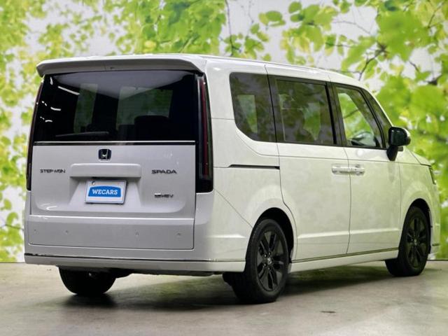 ステップワゴン eHEVスパーダ 純正 11インチ SDナビ/フリップダウンモニター 純正 15.6インチ/ホンダセンシング/両側電動スライドドア/シートヒーター 前席/マルチビューカメラシステム/車線逸脱防止支援システム DVD再生(3枚目)