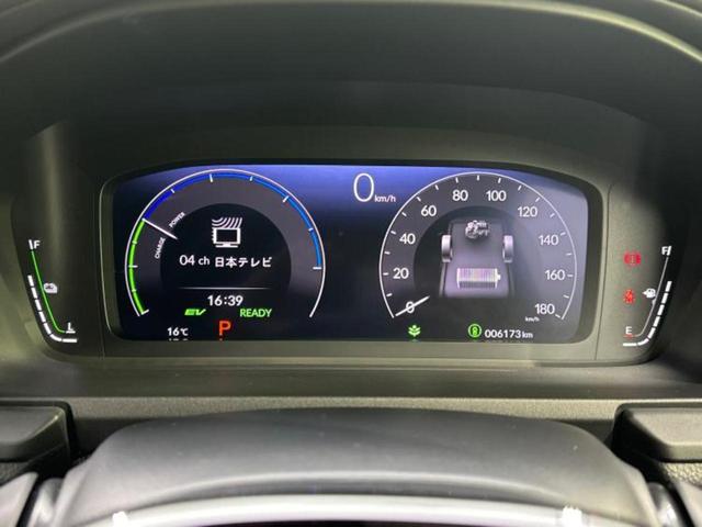 ステップワゴン eHEVスパーダ 純正 11インチ SDナビ/フリップダウンモニター 純正 15.6インチ/ホンダセンシング/両側電動スライドドア/シートヒーター 前席/マルチビューカメラシステム/車線逸脱防止支援システム DVD再生(14枚目)