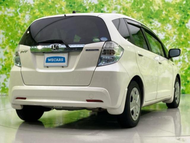 フィットハイブリッド ハイブリッド・スマートセレクションファインスタイル 新品タイヤ/純正 メモリーナビ/シートヒーター/シート ハーフレザー/パーキングアシスト バックガイド/ETC/横滑り防止装置/クルーズコントロール/バックモニター/ワンセグTV/DVD バックカメラ(3枚目)