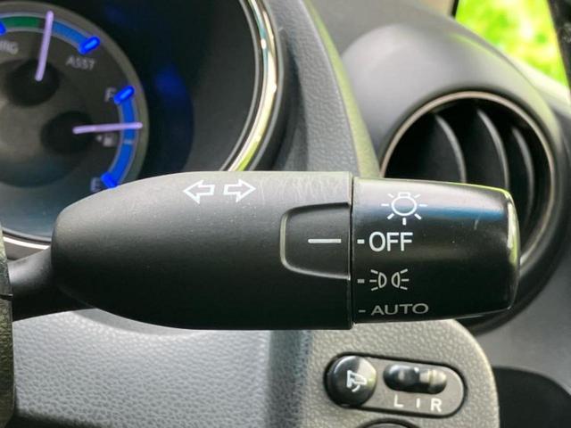 フィットハイブリッド ハイブリッド・スマートセレクションファインスタイル 新品タイヤ/純正 メモリーナビ/シートヒーター/シート ハーフレザー/パーキングアシスト バックガイド/ETC/横滑り防止装置/クルーズコントロール/バックモニター/ワンセグTV/DVD バックカメラ(16枚目)