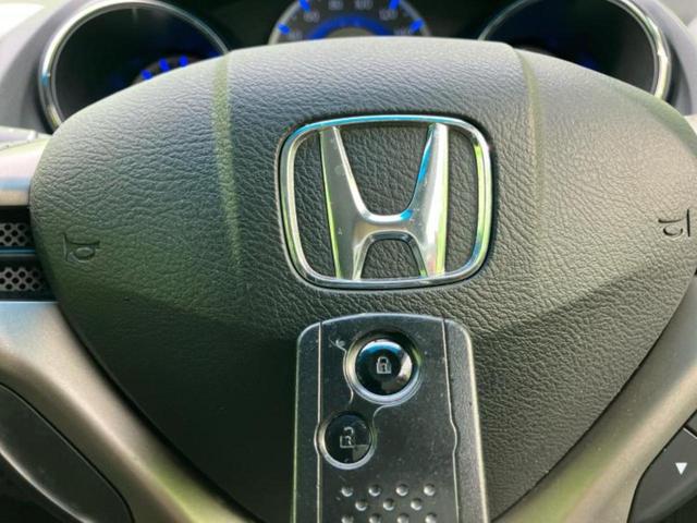 フィットハイブリッド ハイブリッド・スマートセレクションファインスタイル 新品タイヤ/純正 メモリーナビ/シートヒーター/シート ハーフレザー/パーキングアシスト バックガイド/ETC/横滑り防止装置/クルーズコントロール/バックモニター/ワンセグTV/DVD バックカメラ(37枚目)