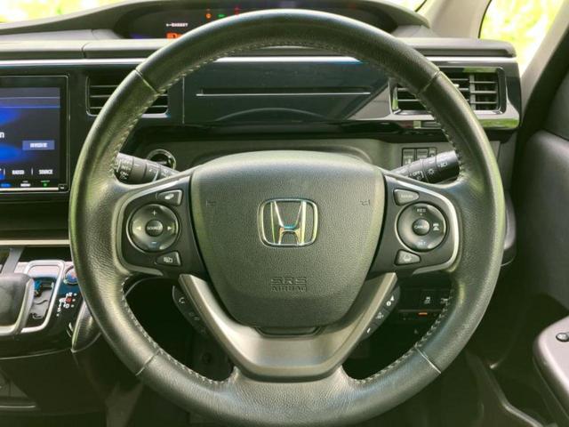 ステップワゴンスパーダ スパーダハイブリッドG・ホンダセンシング 純正 9インチ SDナビ/フリップダウンモニター 純正 11.6インチ/ホンダセンシング/両側電動スライドドア/車線逸脱防止支援システム/パーキングアシスト バックガイド 衝突被害軽減システム 禁煙車(15枚目)