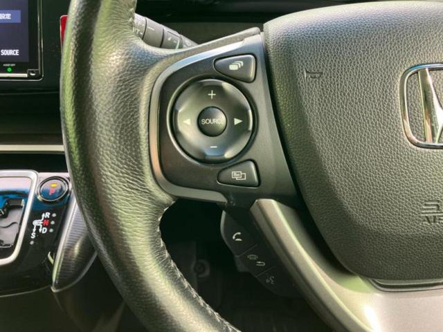 ステップワゴンスパーダ スパーダハイブリッドG・ホンダセンシング 純正 9インチ SDナビ/フリップダウンモニター 純正 11.6インチ/ホンダセンシング/両側電動スライドドア/車線逸脱防止支援システム/パーキングアシスト バックガイド 衝突被害軽減システム 禁煙車(30枚目)