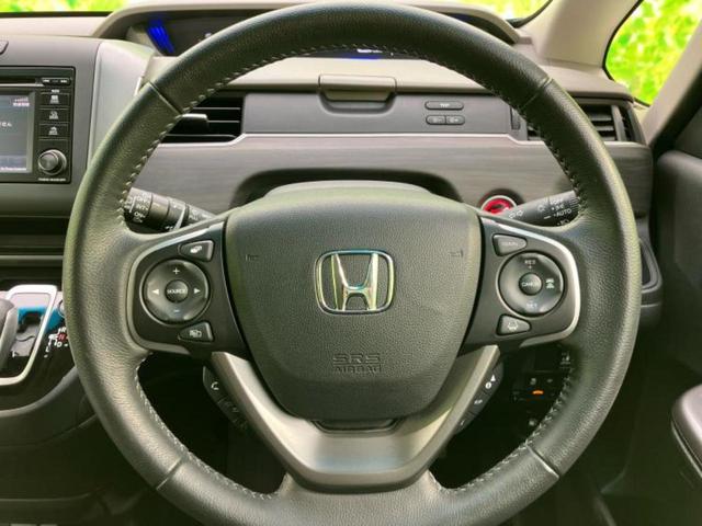 フリード＋ハイブリッド ハイブリッドＧホンダセンシング　新品タイヤ／保証書／ディスプレイオーディオ／ホンダセンシング／両側電動スライドドア／シートヒーター　前席／車線逸脱防止支援システム／シート　ハーフレザー／ドライブレコーダー　前後　衝突被害軽減システム（14枚目）