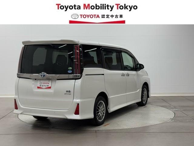 ノア ハイブリッドＳｉ　ダブルバイビーＩＩ　Ｂカメラ　横滑り防止装置　記録簿有　ＬＥＤ　地デジ　ドラレコ　ミュージックプレイヤー接続可　オートクルーズ　ＤＶＤ再生可　メモリナビ　フルフラット　エアバッグ　ＥＴＣ　ナビ＆ＴＶ　３列シート　ＡＢＳ（2枚目）