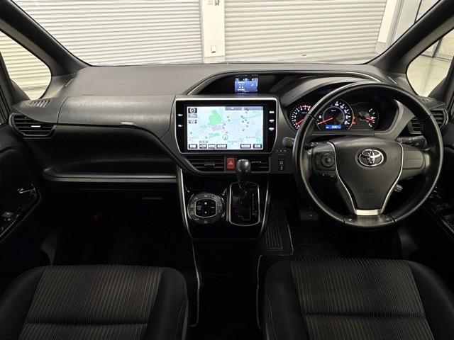 ヴォクシー ZS 煌 地上デジタル TSS 両側パワードア アイドリングストップ車 パワーウィンド 横滑防止 1オーナ 整備記録簿 DVD可 フルフラットシート 盗難防止装置 スマートエントリー Bカメラ AUX ETC(6枚目)