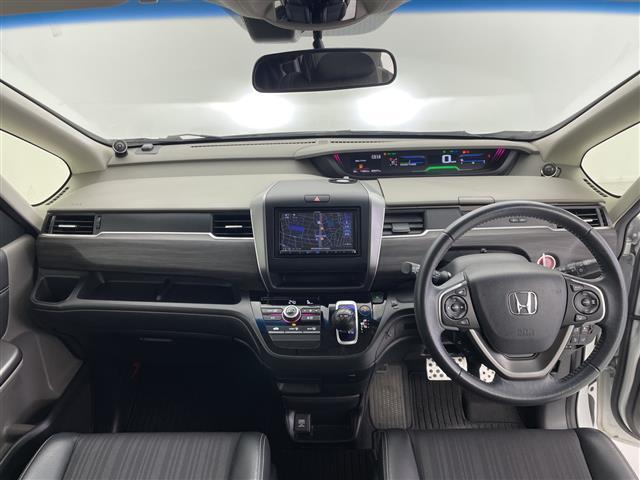 フリードハイブリッド ハイブリッド・Gホンダセンシング 禁煙 社外ナビ 両側パワースライドドア ルーフキャリア レーダークルーズコントロール 衝突軽減ブレーキ レーンキープアシスト RAZOシフトノブ ビルトインETC ハーフレザーシート LEDライト(2枚目)