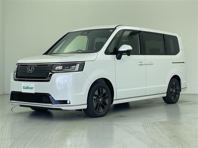 ステップワゴン ｅ：ＨＥＶスパーダ　登録済未使用　純正１１インチナビ　１５インチフリップダウンモニター　両側パワースライドドア　バックカメラ　シートヒーター　衝突軽減　コーナーセンサー　レーンキープ　電動リアゲート　追従クルコン（32枚目）