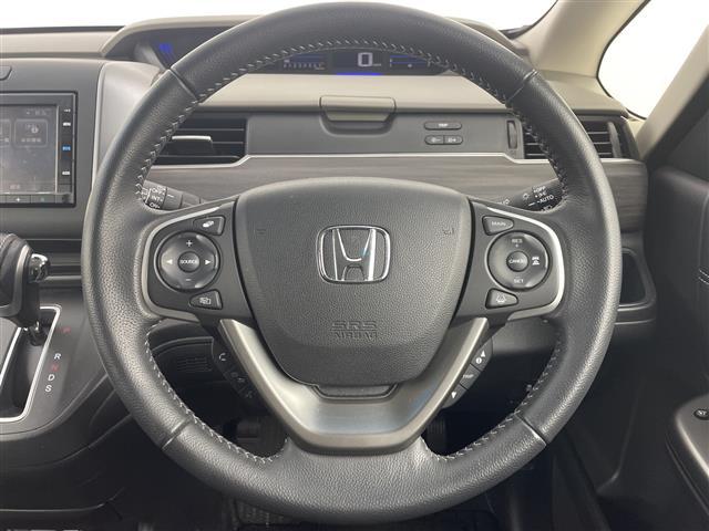 フリード G・ホンダセンシング ホンダセンシング 純正ナビ バック・サイドカメラ 両側パワースライドドア LEDオートライト ハーフレザーシート 前席シートヒーター 純正15インチアルミホイール 後方コーナーセンサー ETC(10枚目)