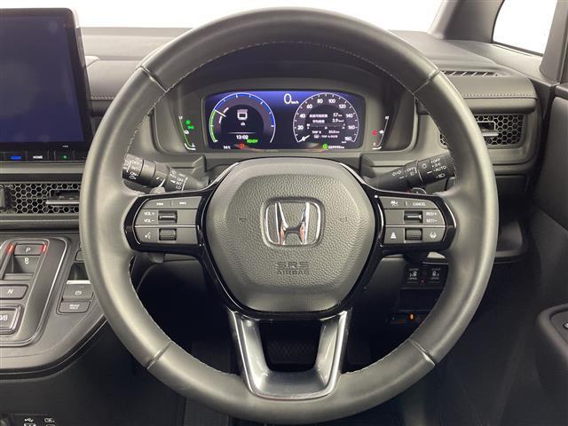 ステップワゴン ｅ：ＨＥＶスパーダ　純正１１．４型ナビ　Ｂカメラ　両側パワスラ　パワーバックドア　ハーフレザーシート　前席シートヒーター　　ＥＴＣ　ＣＭＢＳ　ＡＣＣ先行車検知　ＬＫＡＳ　ＢＳＭ　先行車発進　標識認識機能　踏み間違い衝突軽（8枚目）