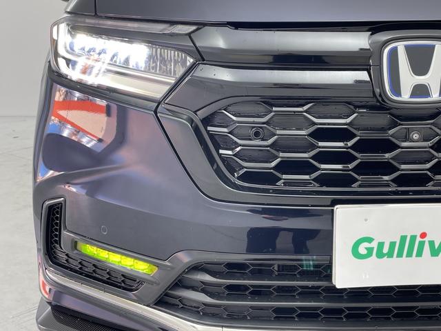 オデッセイハイブリッド ｅ：ＨＥＶアブソルート・ＥＸ　純正１０型ナビ　Ｂｌｕｅｔｏｏｔｈ　純正フリップダウンモニター　両側パワースライドドア　パワーバックドア　前席パワーシート　前席シートヒーター　ハーフレザーシート　ＢＳＭ　ＣＭＢＳ　ＡＣＣ先行車発進（17枚目）