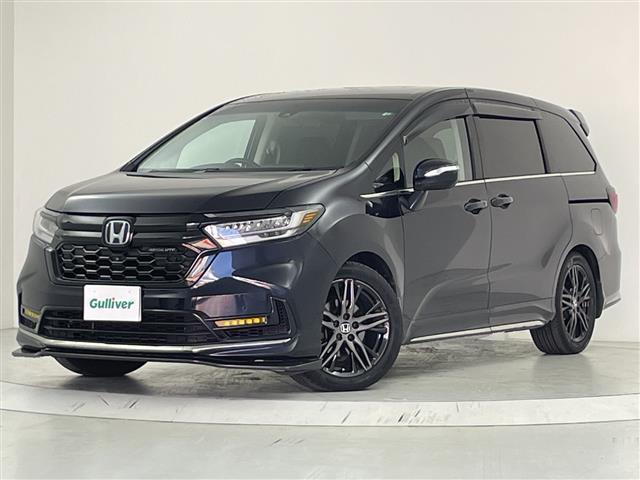 オデッセイハイブリッド ｅ：ＨＥＶアブソルート・ＥＸ　純正１０型ナビ　Ｂｌｕｅｔｏｏｔｈ　純正フリップダウンモニター　両側パワースライドドア　パワーバックドア　前席パワーシート　前席シートヒーター　ハーフレザーシート　ＢＳＭ　ＣＭＢＳ　ＡＣＣ先行車発進（19枚目）